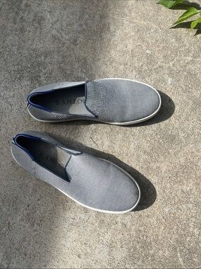 Rothy's Slip-On Sneakers in Light Gray with Blue Trim